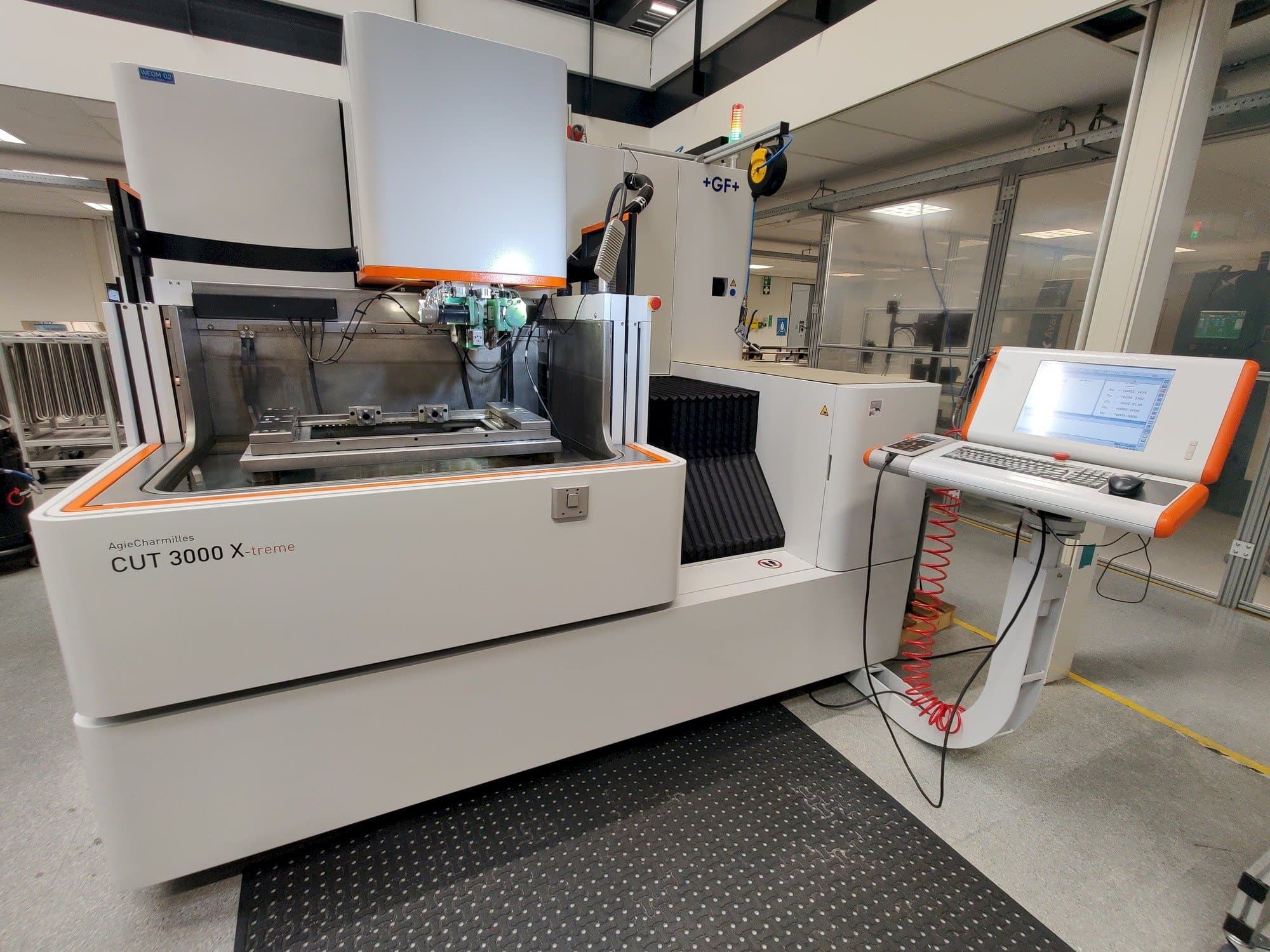 Front view of GF AgieCharmilles CUT 3000 X machine