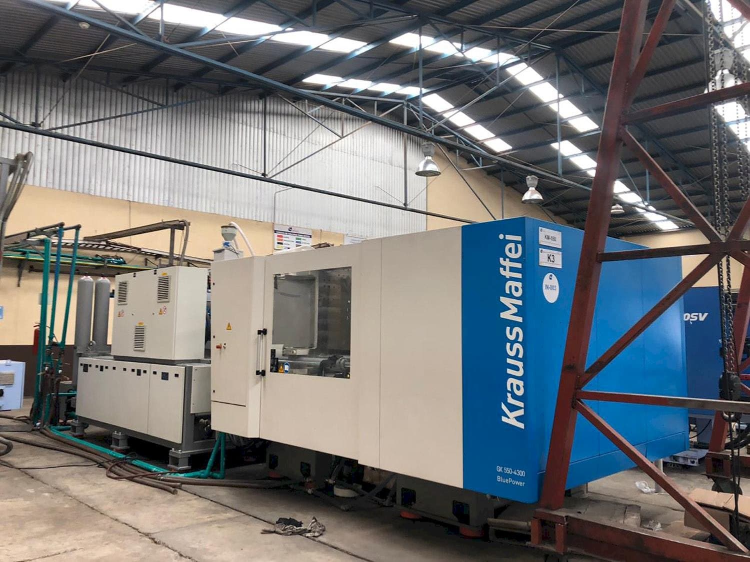 Front view of Krauss Maffei 550-4300 GX  machine