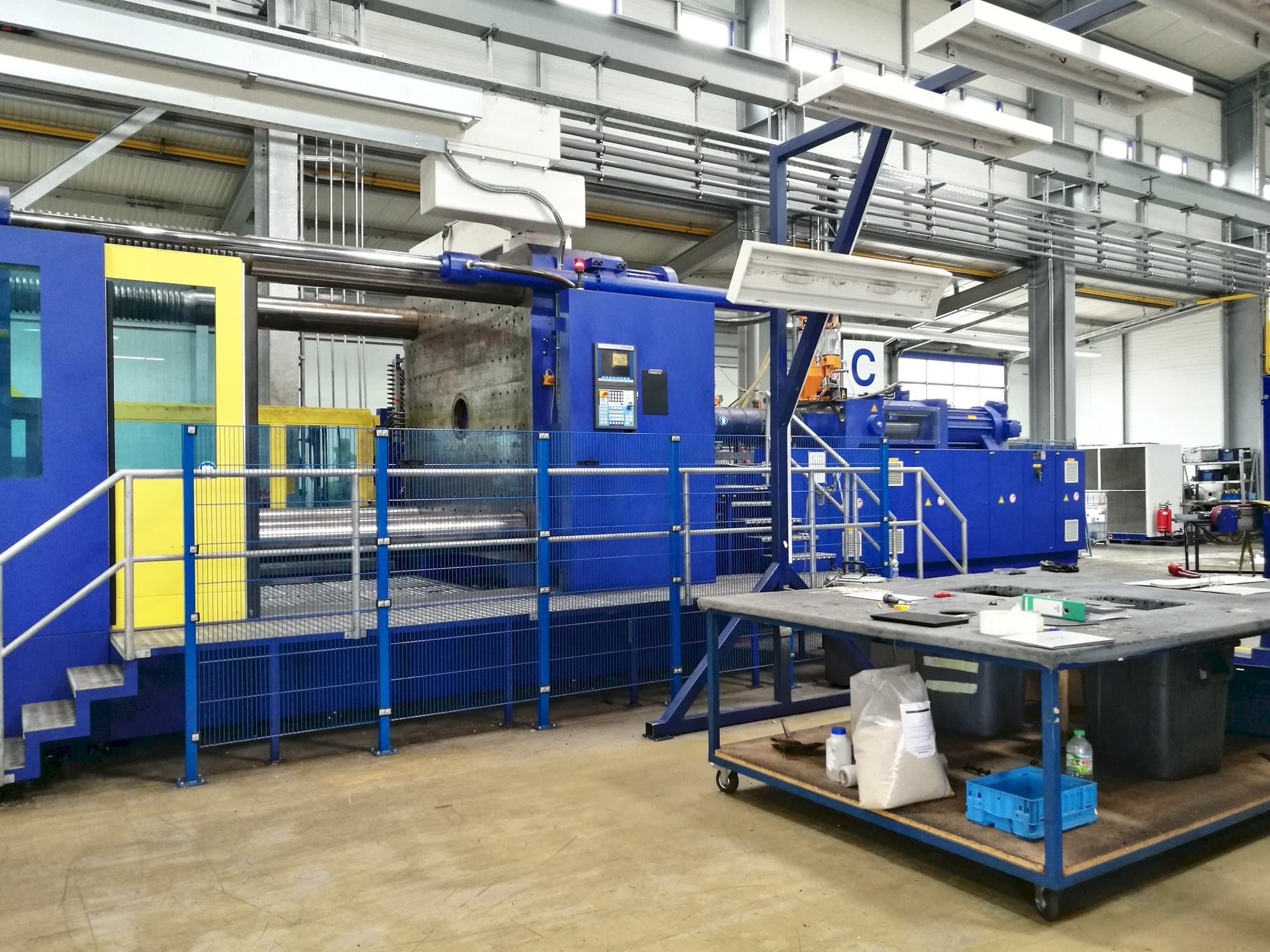 Front view of Krauss Maffei 2300-12000 MX  machine