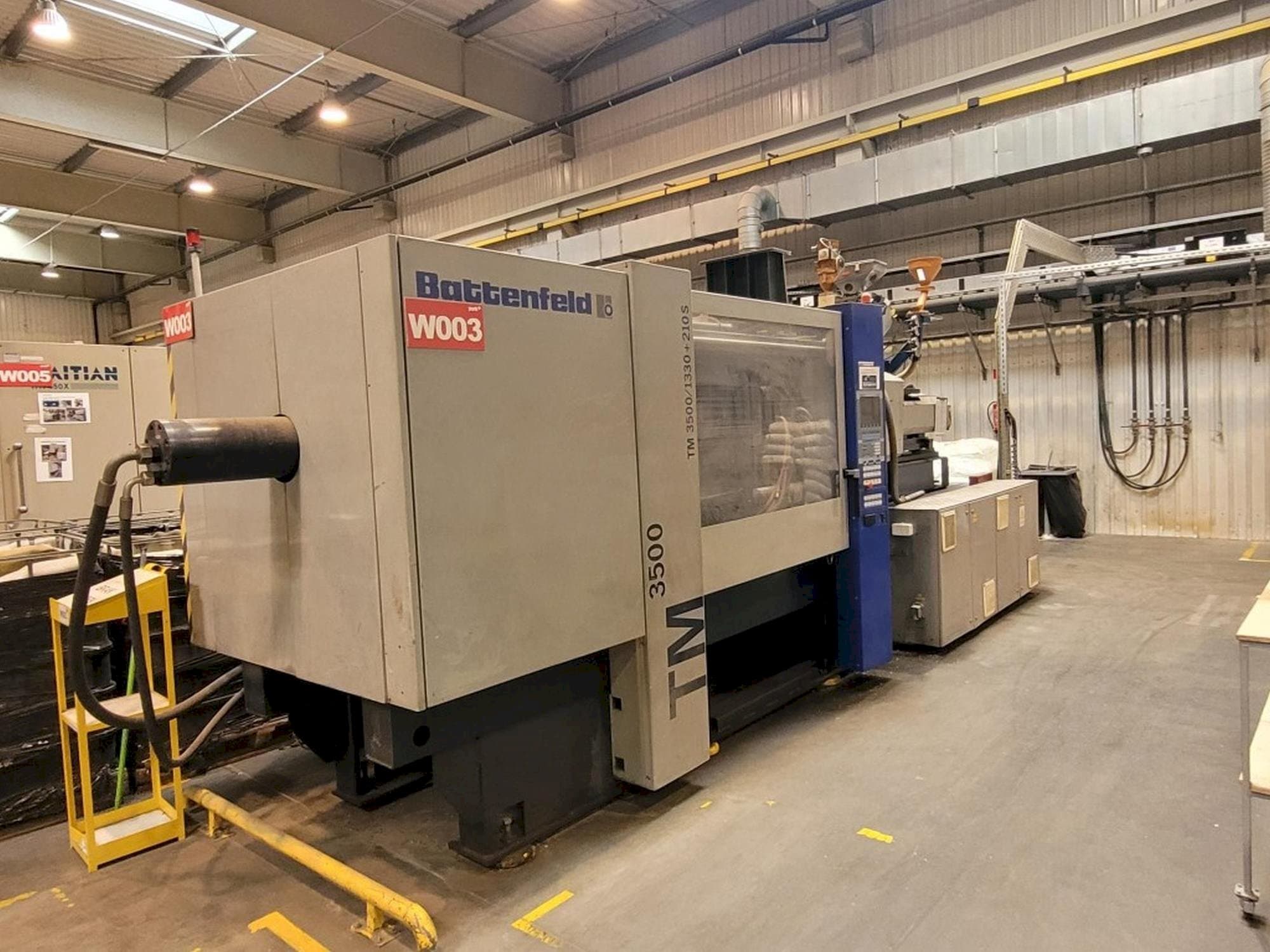 Front view of Battenfeld TM 3500/1330+210S  machine