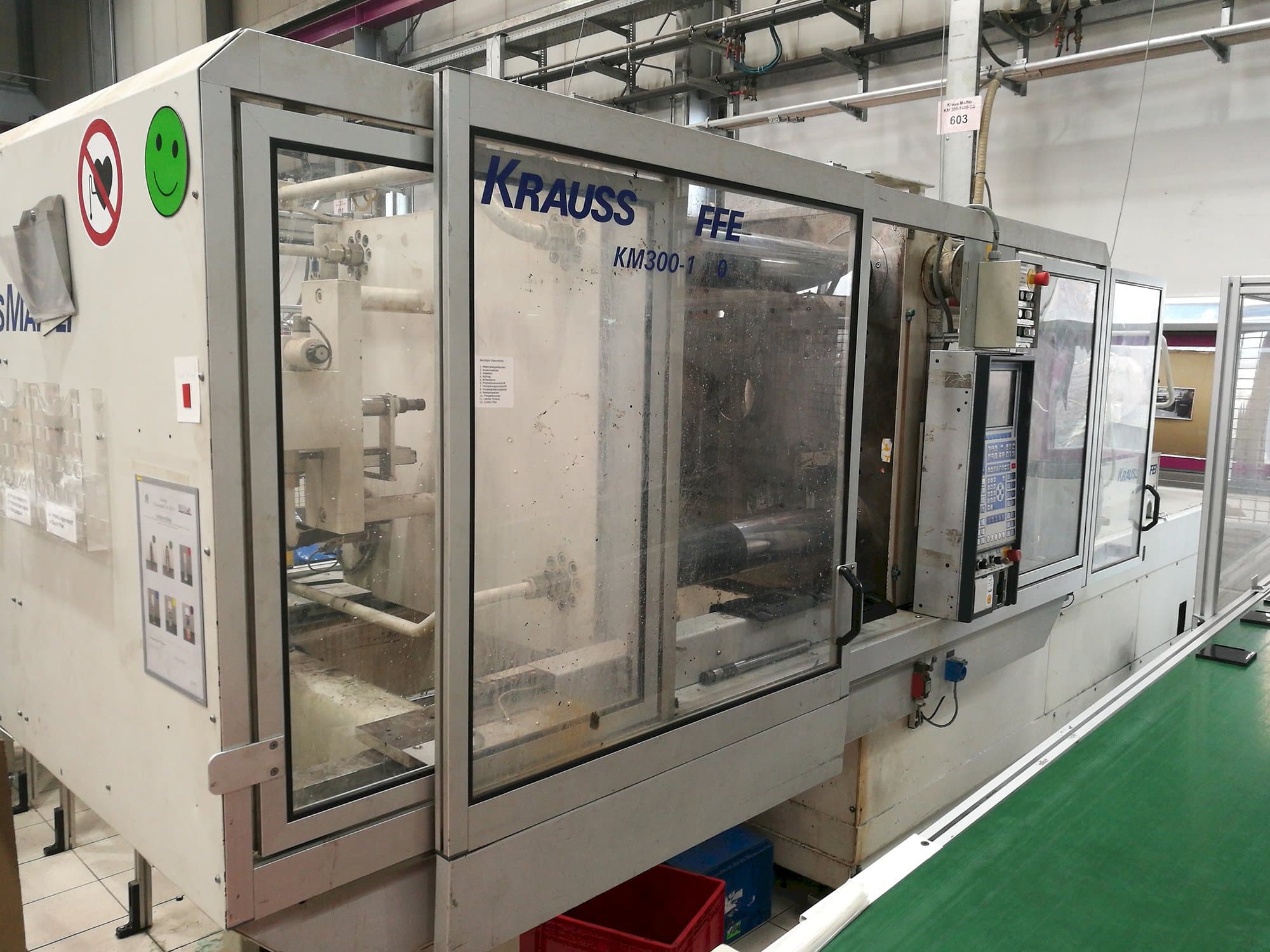 Left view of Krauss Maffei KM 300-1400 C2 Machine