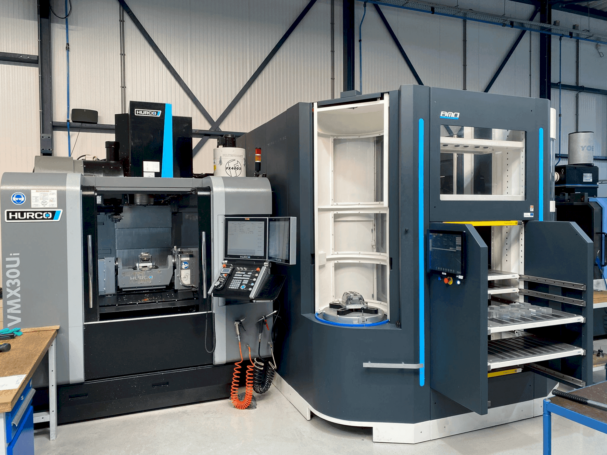 Front view of Hurco VMX30Ui + BMO Automation Titanium 50  machine
