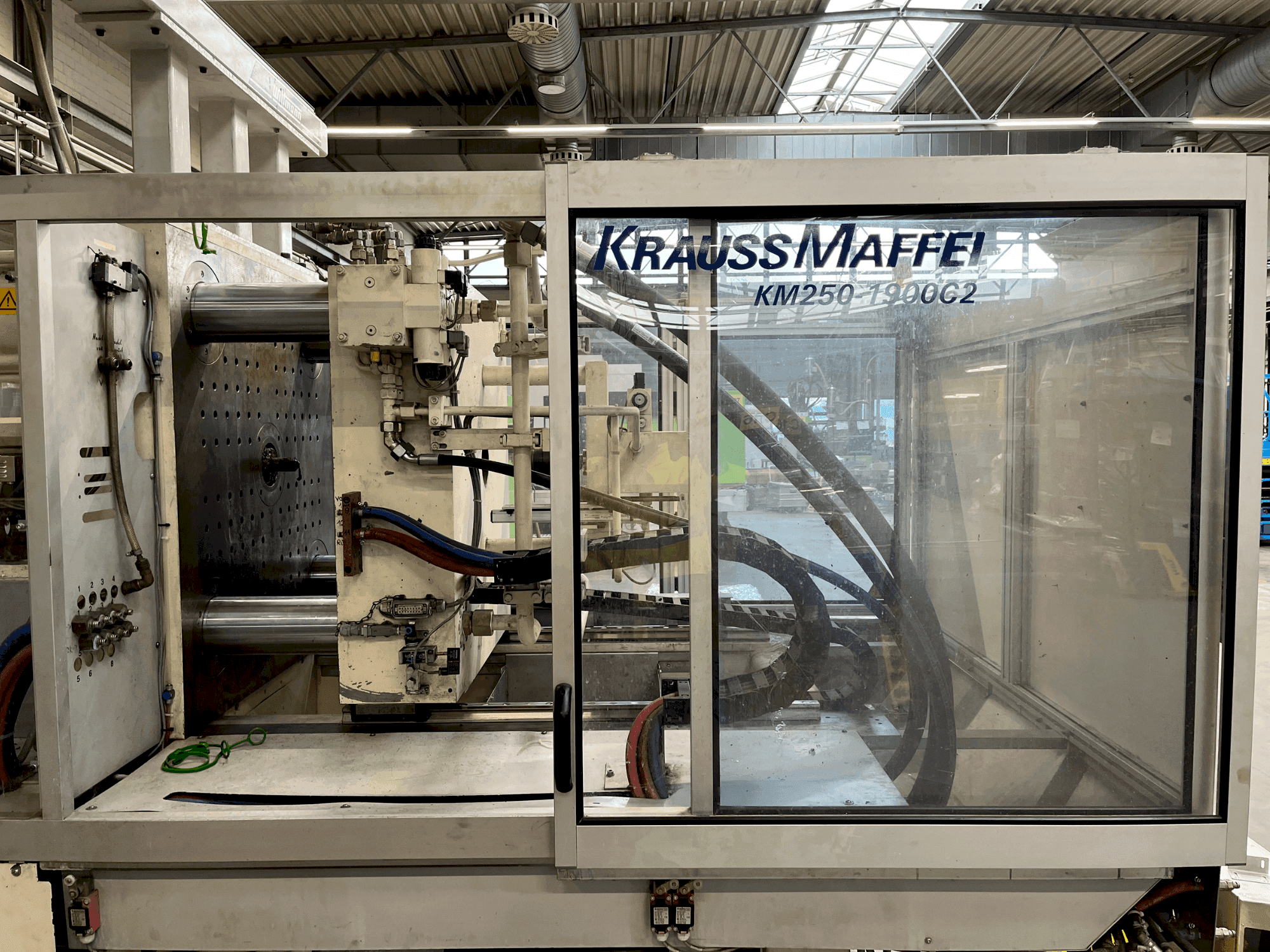 Front view of Krauss Maffei 250-1900 C2  machine