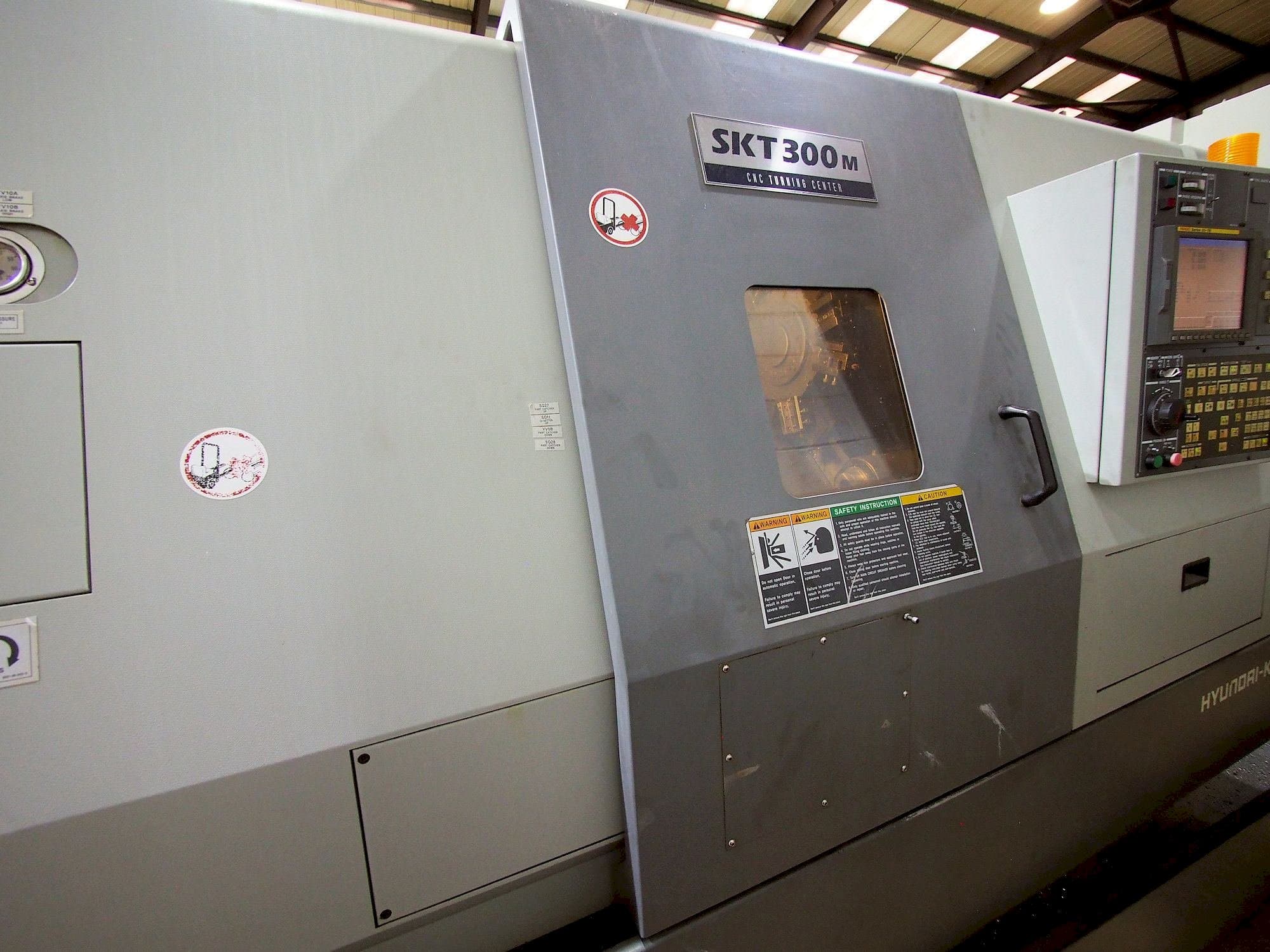 Front view of Hyundai Kia SKT 300M  machine