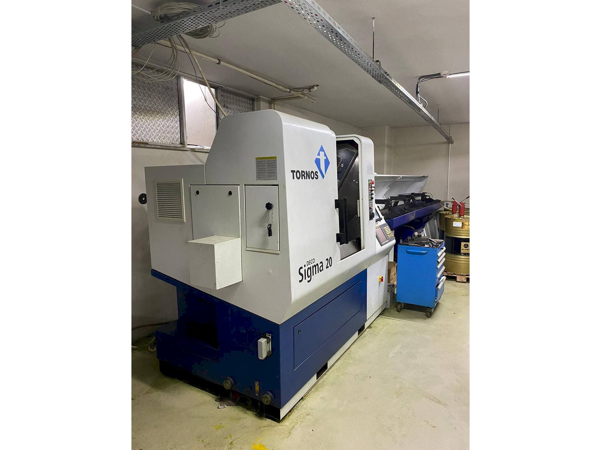 Left side view of Tornos Delta Sigma 20  machine