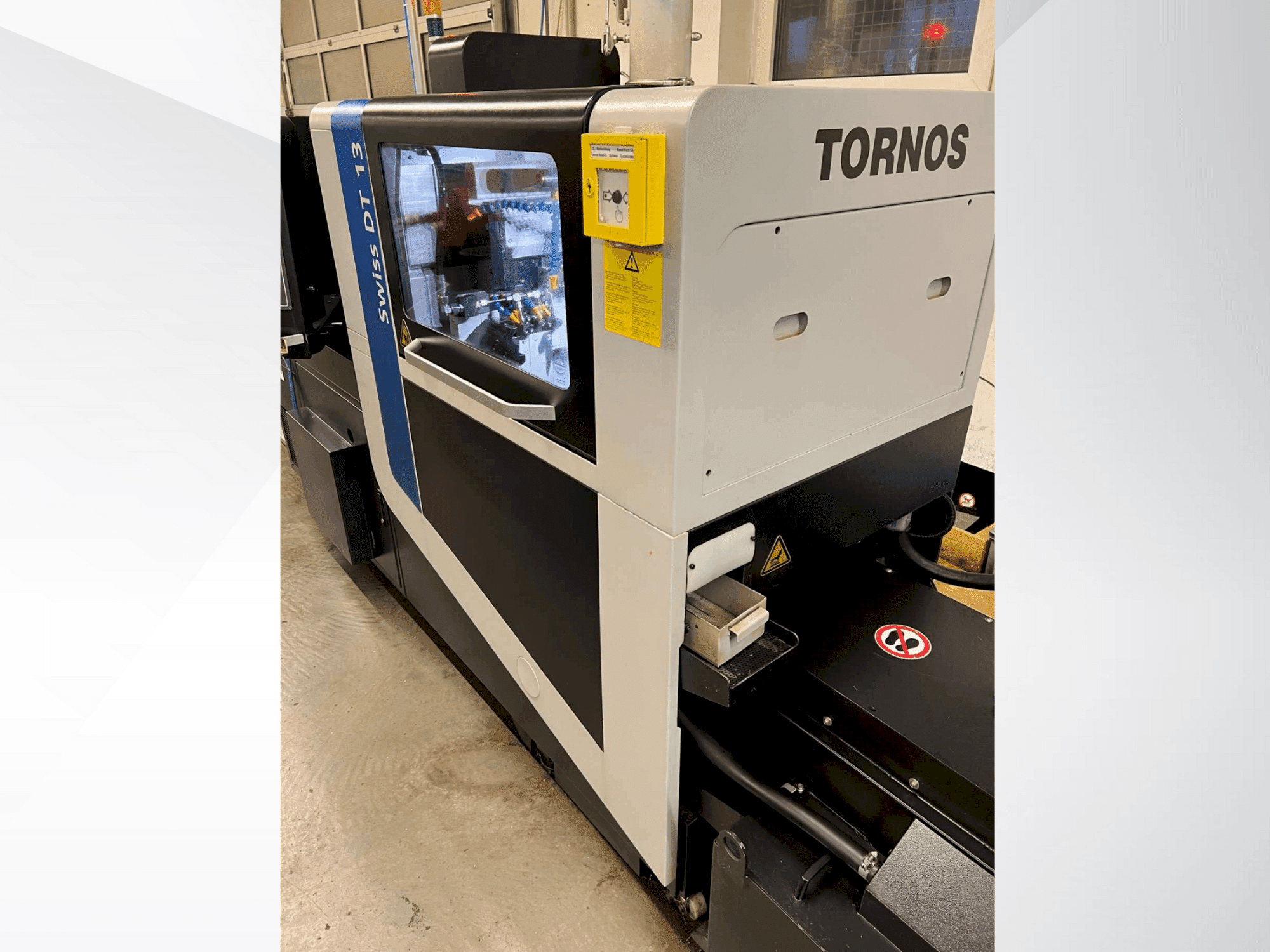 Front view of Tornos Swiss DT 13  machine