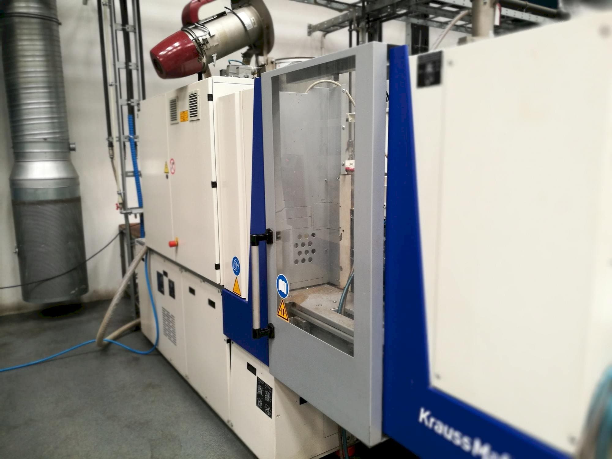 Front view of Krauss Maffei KM 35-55 CX  machine