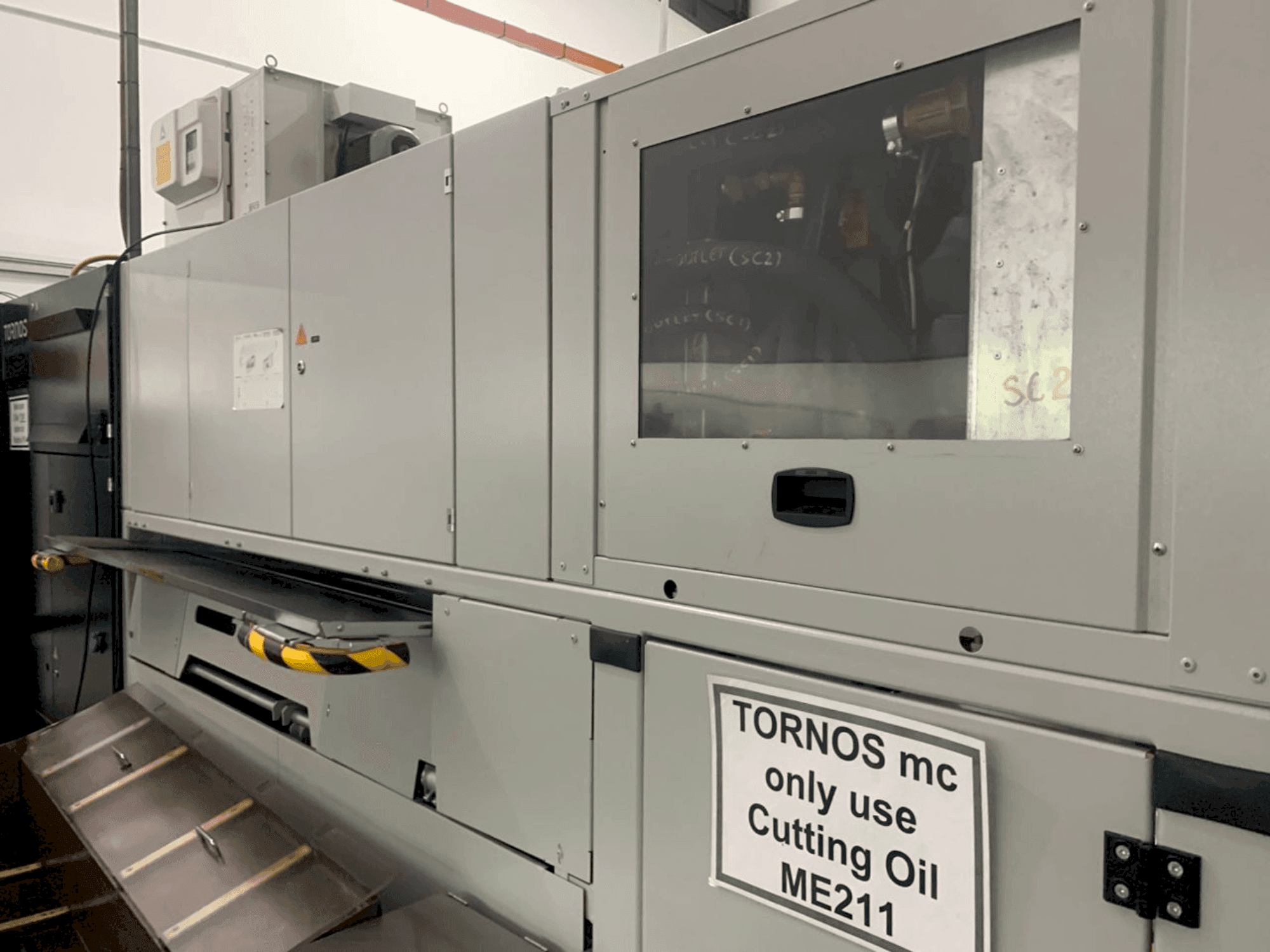 Front view of TORNOS MultiSwiss 6x16  machine