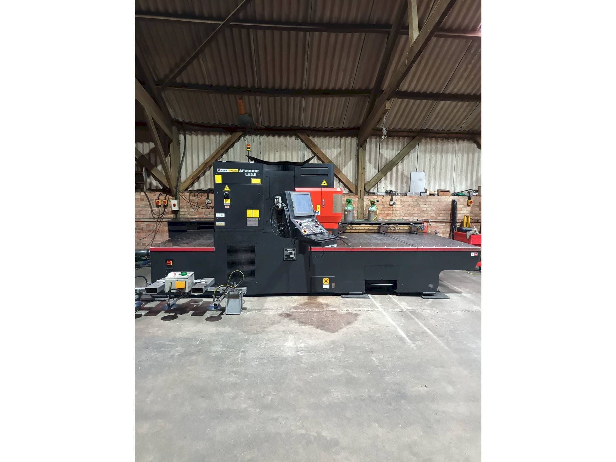 Front view of AMADA LC 2415 alpha 4 NT  machine