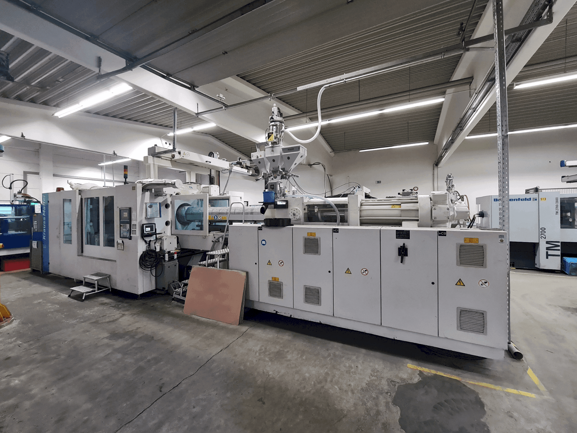 Front view of Krauss Maffei 800-6100 MX  machine