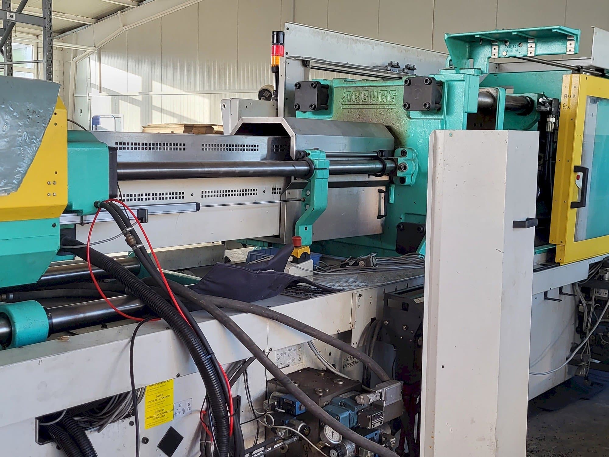 Left view of Arburg Allrounder Centex 570C2200-1300  machine