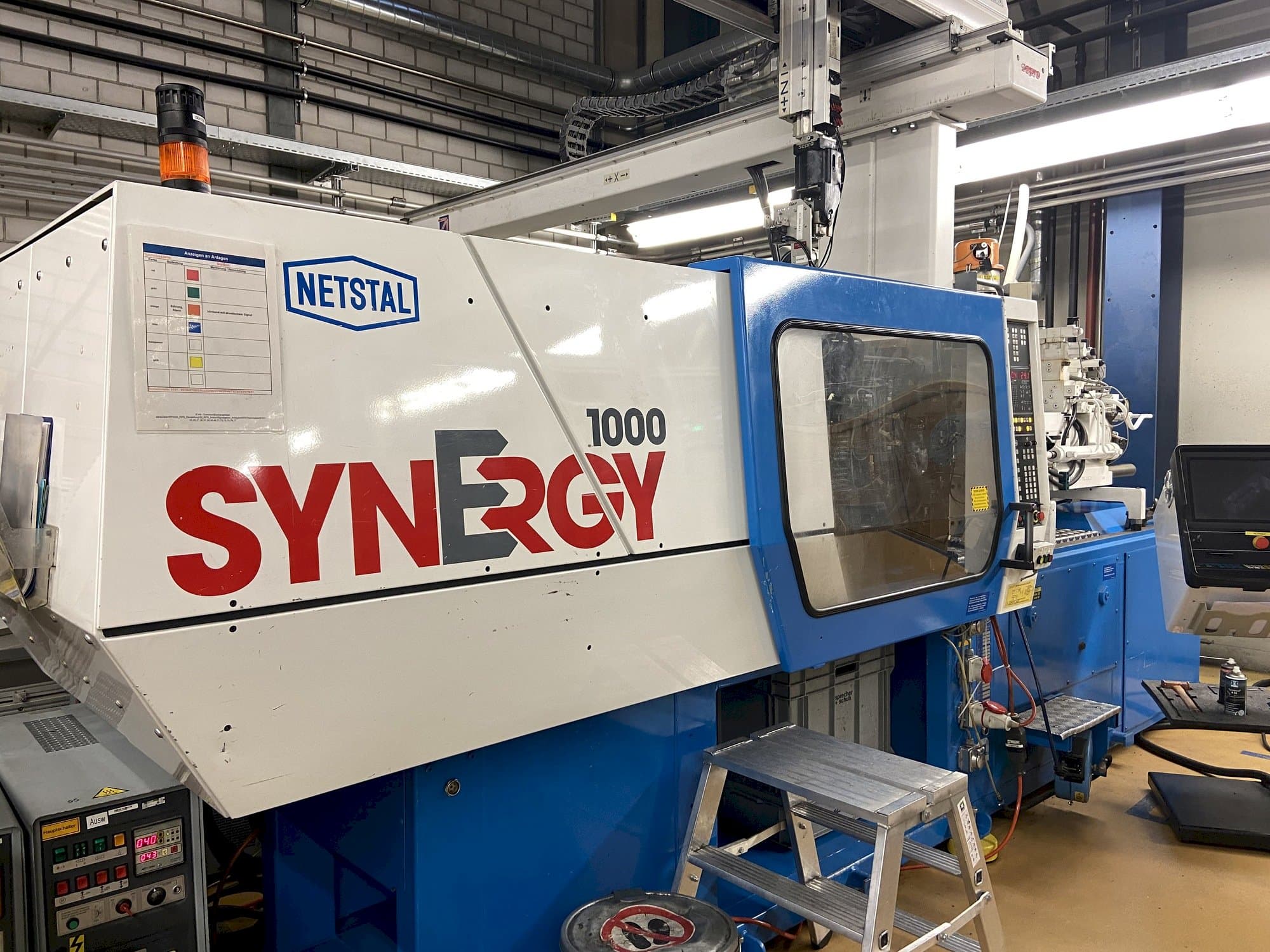 Front view of Netstal Synergy 1000-230  machine