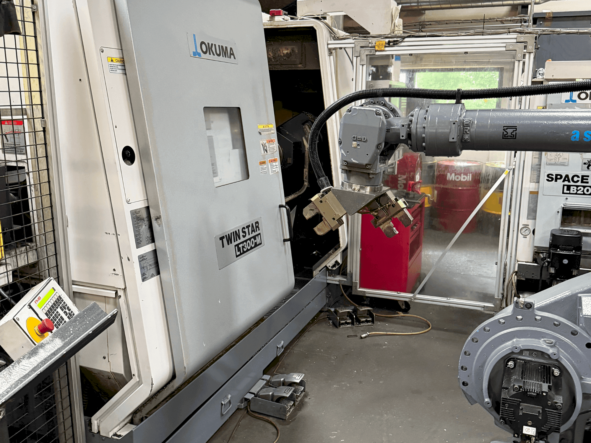 Front view of Okuma Twinstar LT300-M  machine