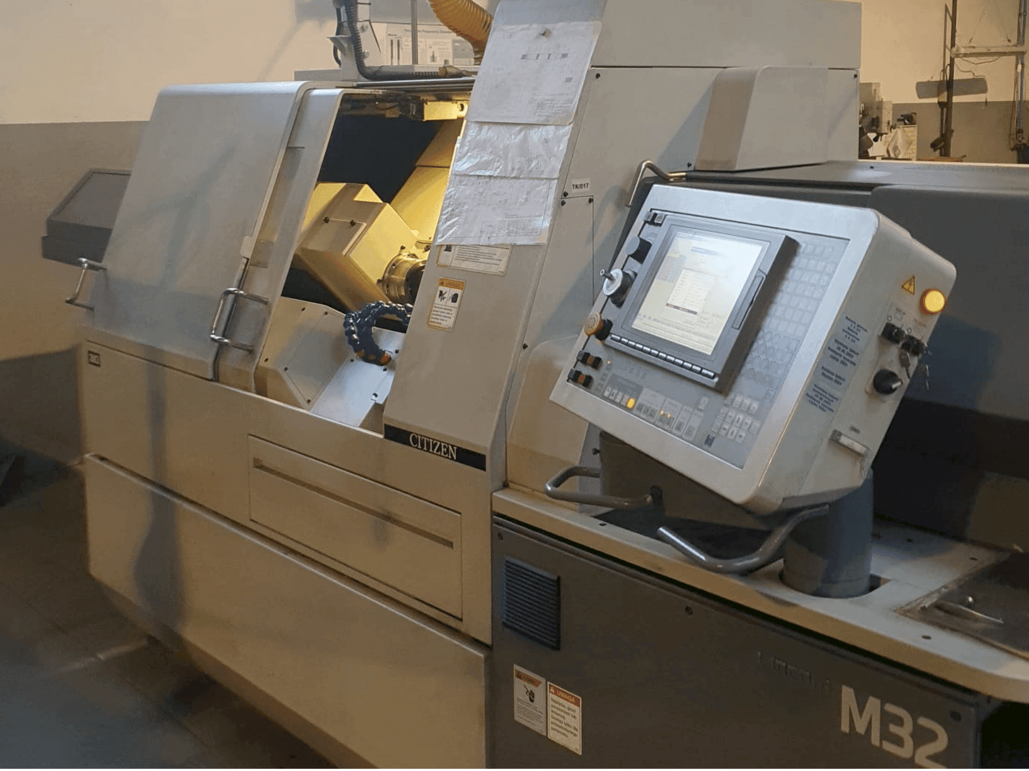 Front view of Citizen M32 III  machine