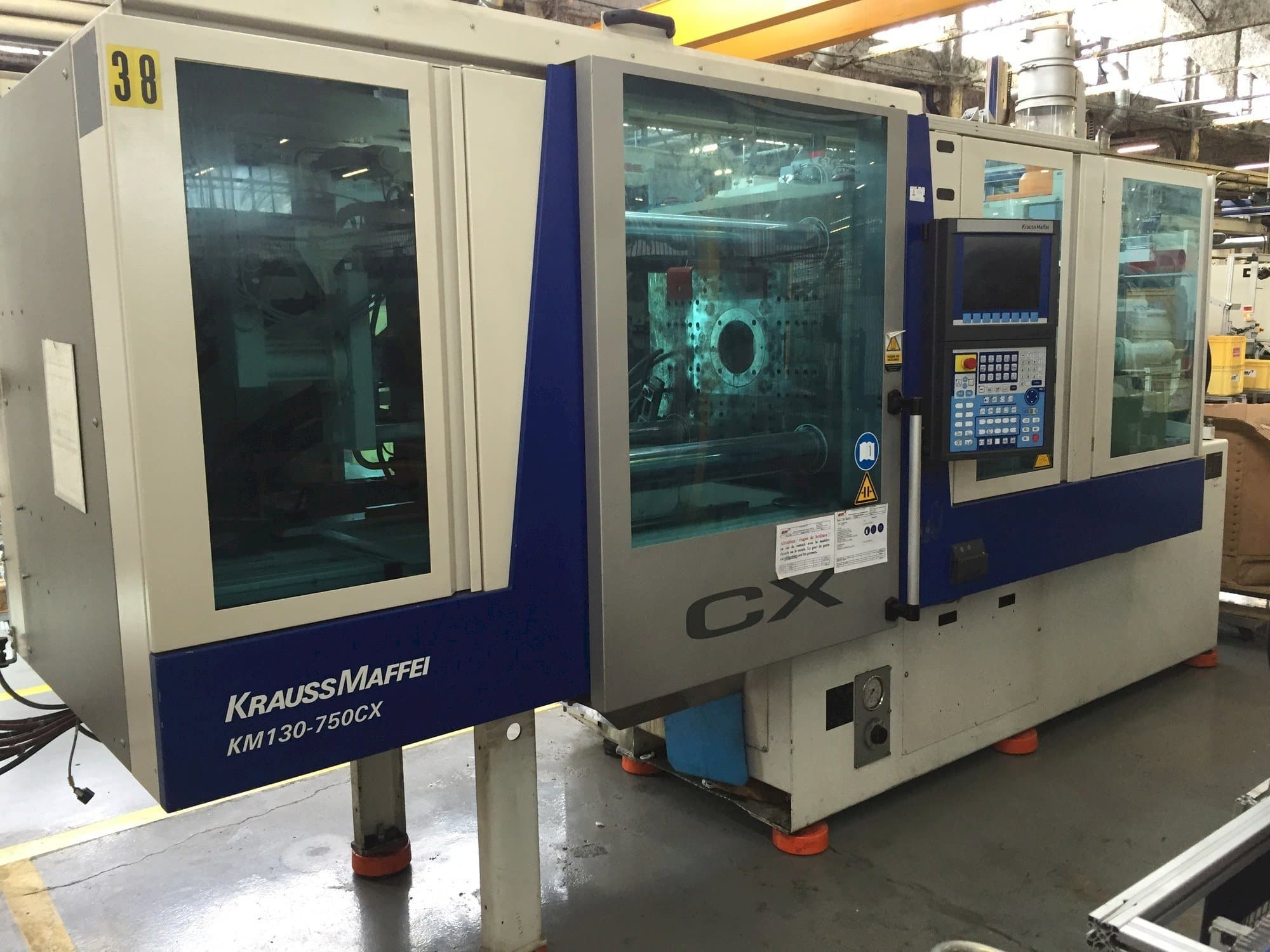 Front view of Krauss Maffei 130-750 CX  machine