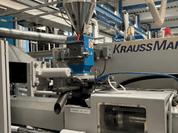 Front view of Krauss Maffei 125-520 C1  machine