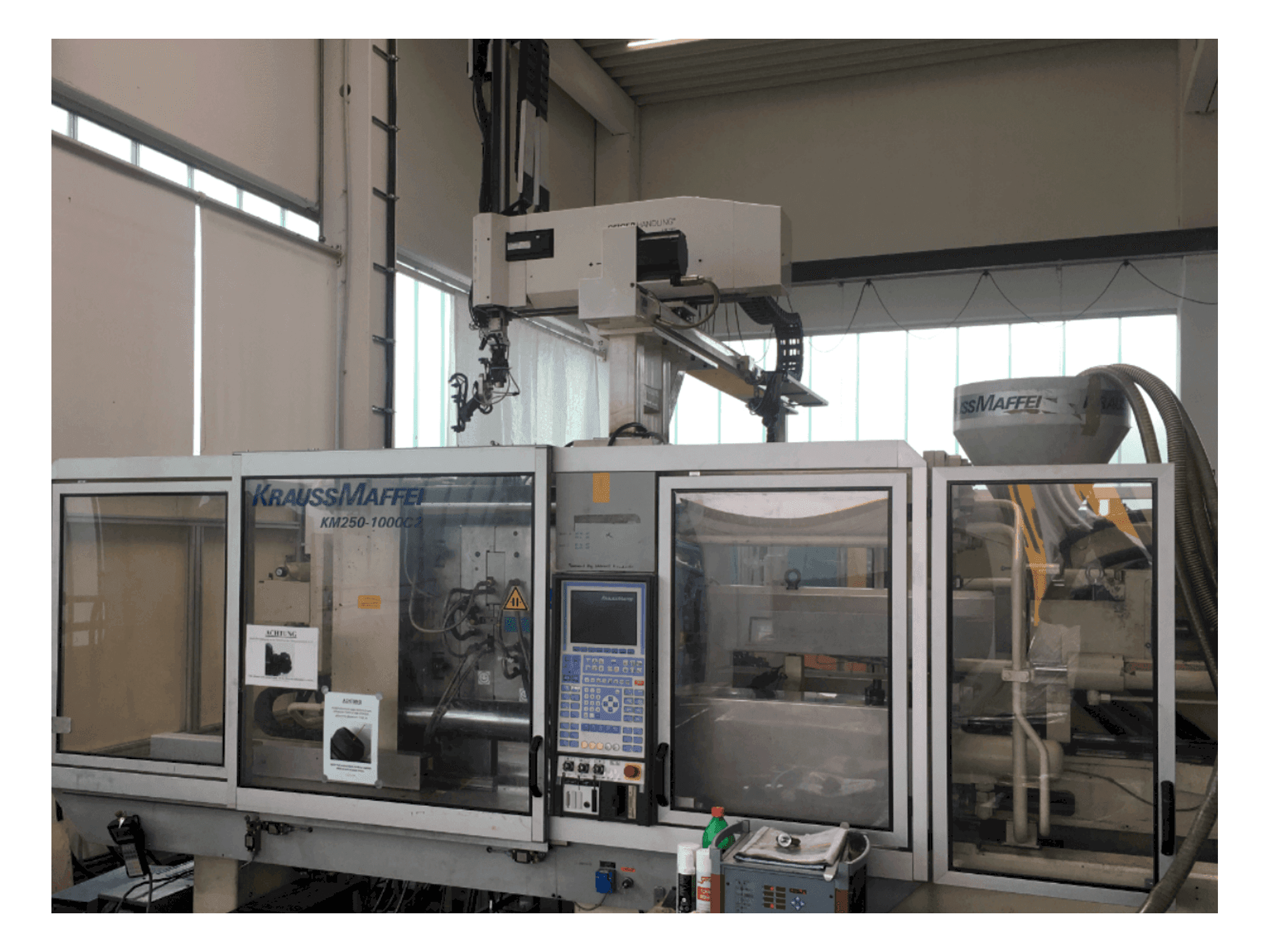 Front view of Krauss Maffei 250-1000 C2 machine